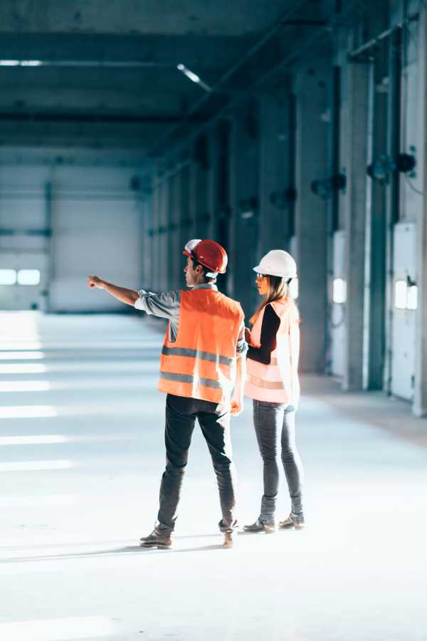 facilities managers in warehouse